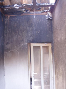 2009-juli-brand-deur-naar-de-slaapkamer.jpg